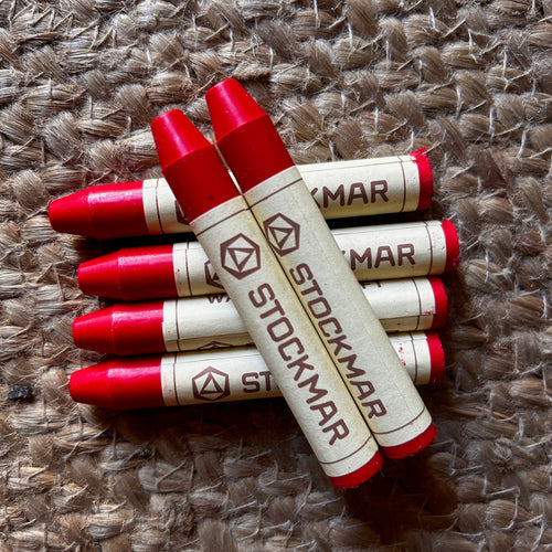 Red beeswax crayon for rosy cheeks on dolls