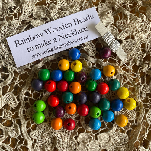 Rainbow wooden beads to make a necklace